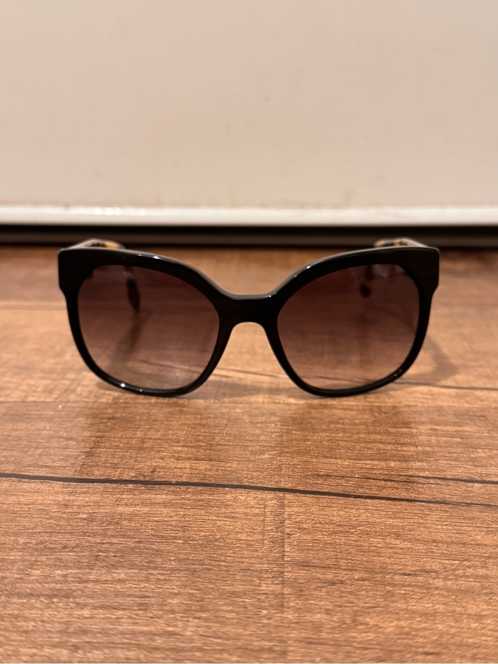 Prada Black Frame Sunglasses with Brown Gradient Lenses